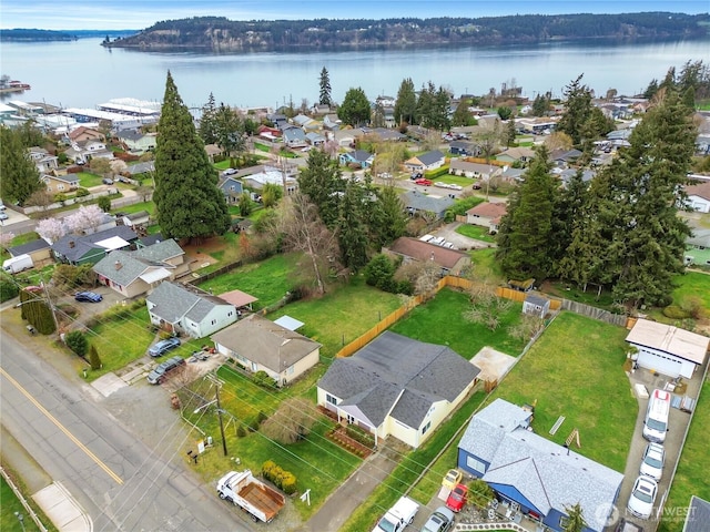 aerial view with a residential view and a water view