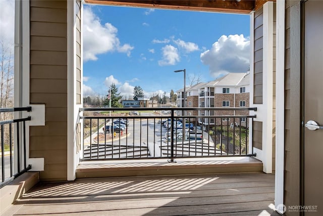 balcony featuring a residential view