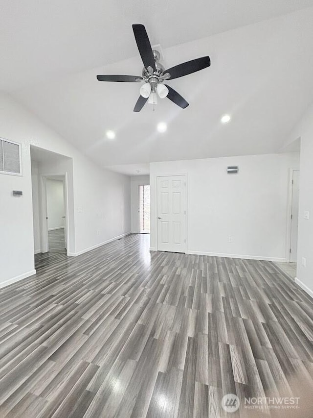 unfurnished living room with recessed lighting, baseboards, wood finished floors, and vaulted ceiling