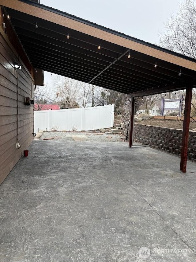 view of patio / terrace with fence