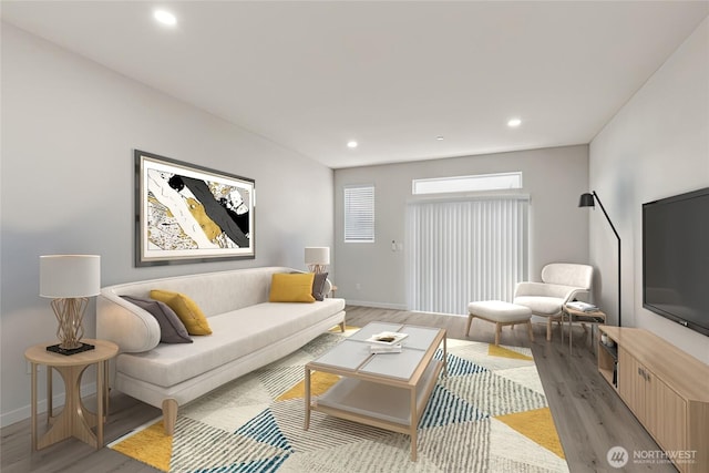 living area with recessed lighting, light wood-type flooring, and baseboards