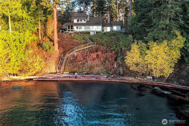 exterior space with a water view