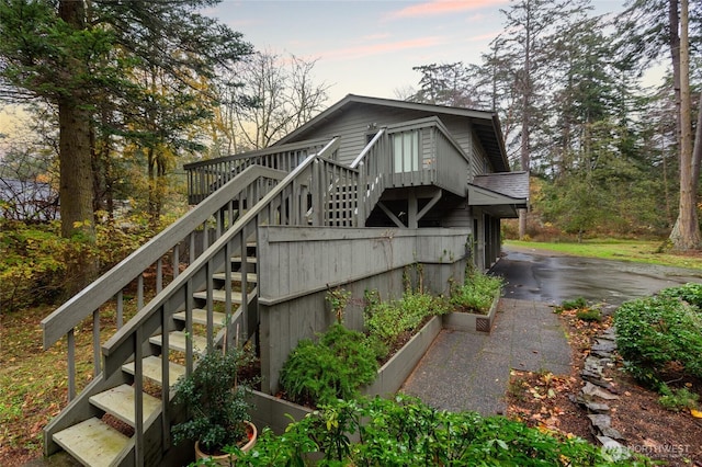 exterior space with a deck and stairway