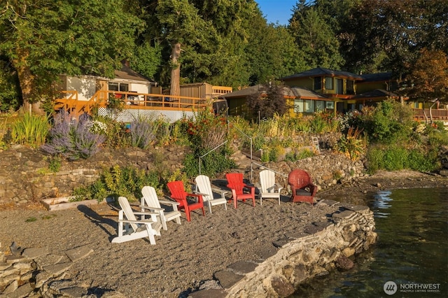 view of yard with a wooden deck