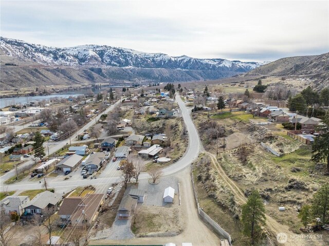 drone / aerial view with a mountain view and a residential view