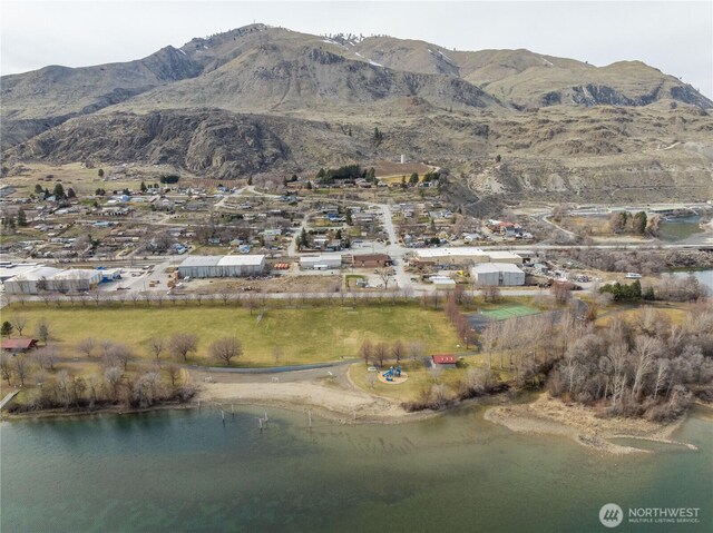 aerial view with a water and mountain view