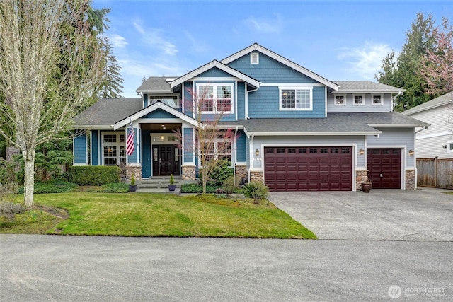 craftsman house with concrete driveway, a garage, stone siding, and a front yard