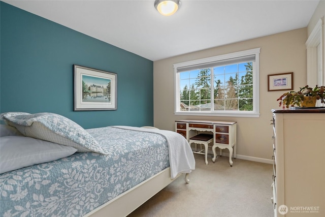 carpeted bedroom with baseboards