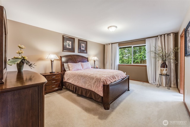 bedroom with light carpet