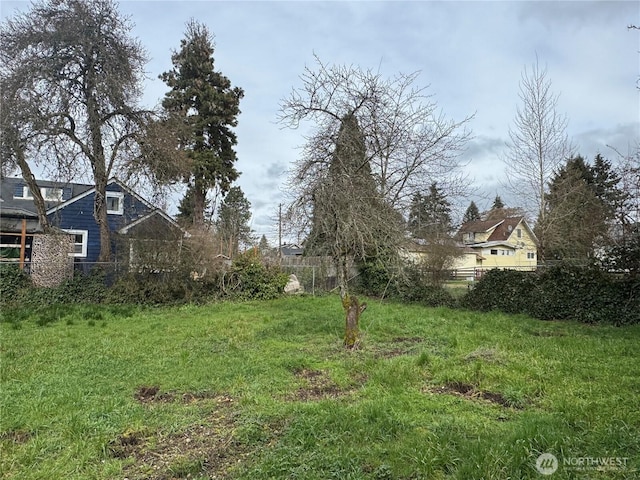 view of yard featuring fence