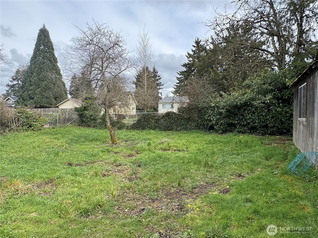 view of yard with fence