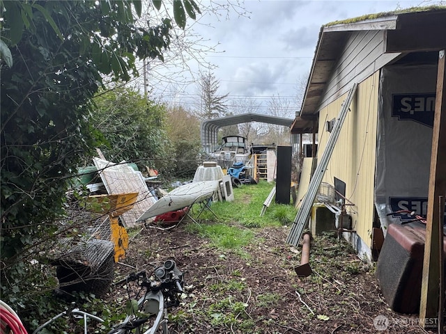 view of yard with a carport