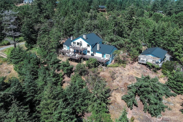 aerial view featuring a forest view