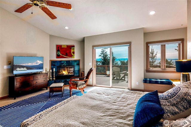 bedroom featuring vaulted ceiling, access to outside, recessed lighting, and multiple windows