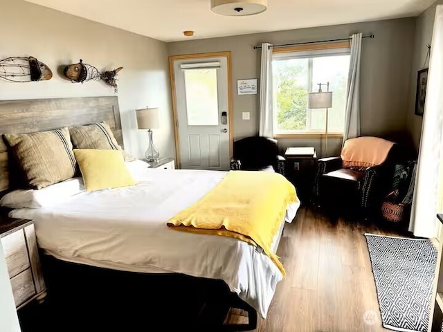 bedroom featuring wood finished floors