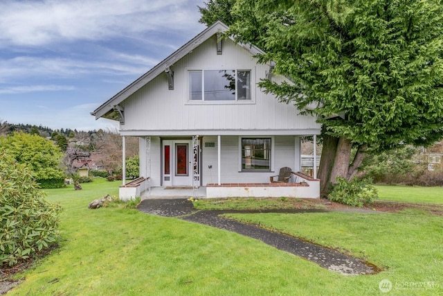 249 Cascade Ave, Langley, WA 98260 - view of front of house with covered porch and a front lawn