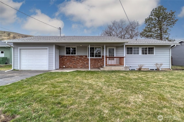 single story home featuring driveway, a shingled roof, a front yard, an attached garage, and brick siding