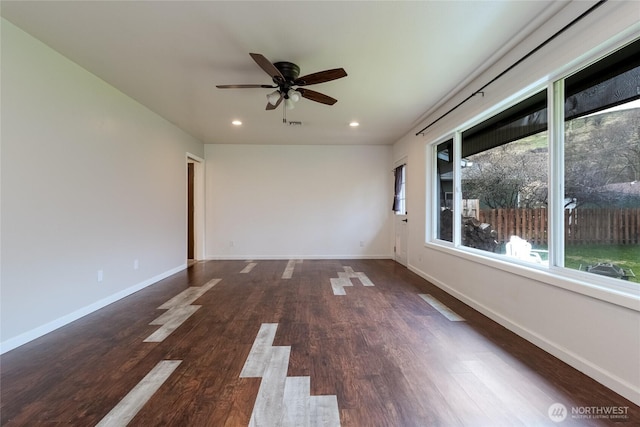 unfurnished room with recessed lighting, a ceiling fan, baseboards, and wood finished floors