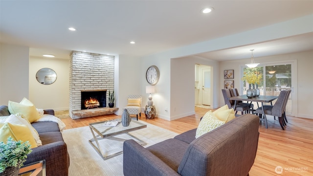 living room featuring recessed lighting and light wood finished floors