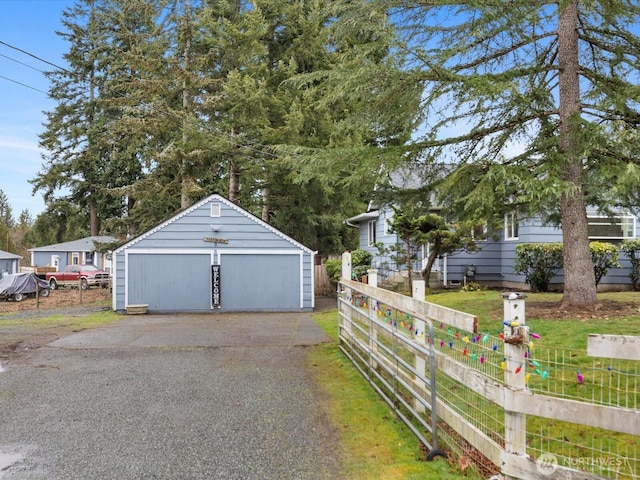 detached garage with fence