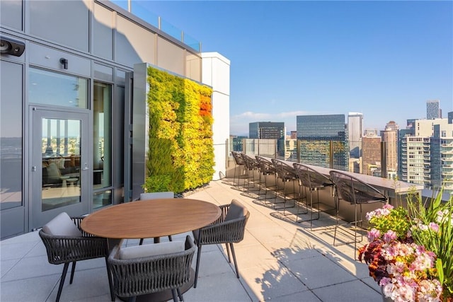 view of patio / terrace with a city view