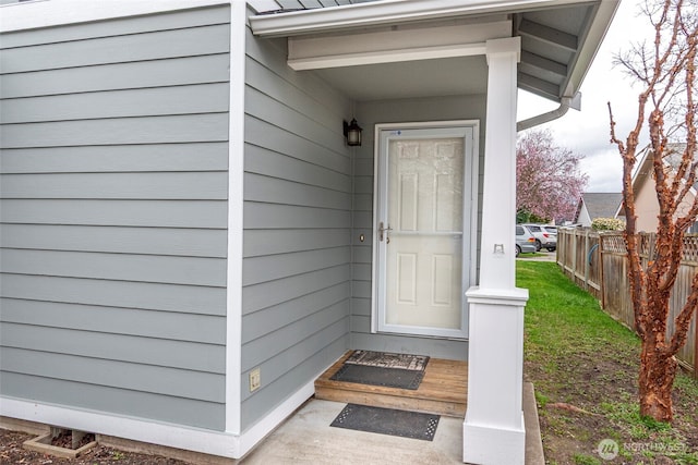 property entrance with fence