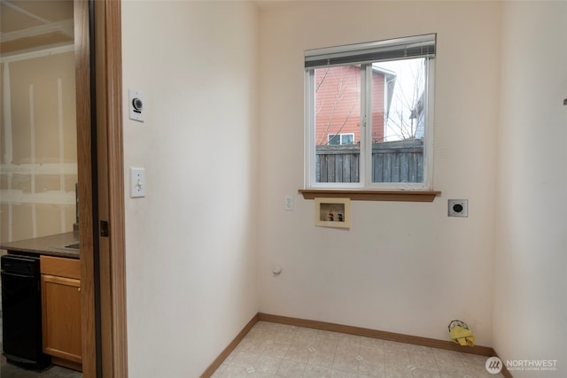 laundry room featuring light floors, baseboards, electric dryer hookup, washer hookup, and hookup for a gas dryer