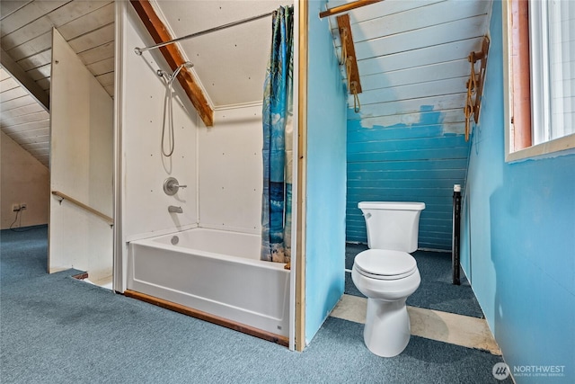 full bathroom featuring toilet and shower / bath combo with shower curtain