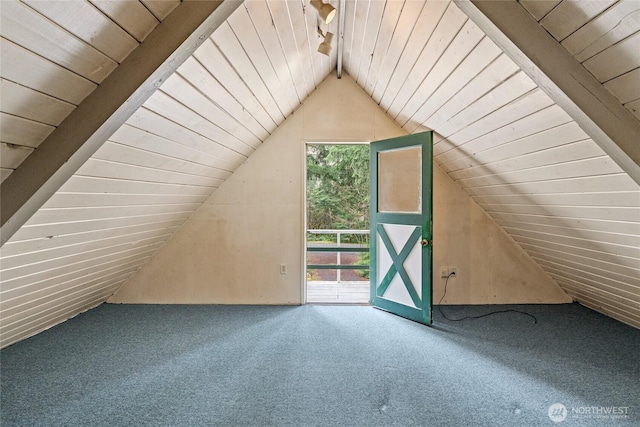 additional living space with carpet flooring, wooden ceiling, and vaulted ceiling with beams