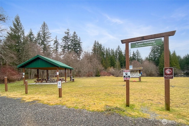 surrounding community featuring a gazebo and a yard