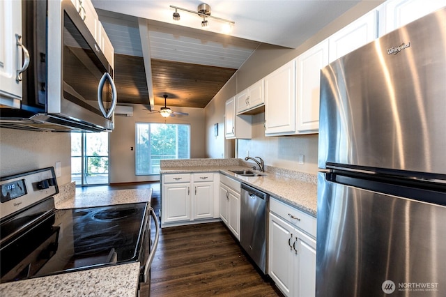 600 Harrison St, Friday Harbor, WA 98250 - kitchen with a ceiling fan, a sink, appliances with stainless steel finishes, white cabinets, and wood ceiling