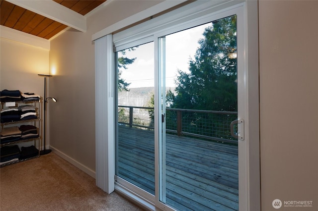 600 Harrison St, Friday Harbor, WA 98250 - entryway with baseboards, beam ceiling, and carpet
