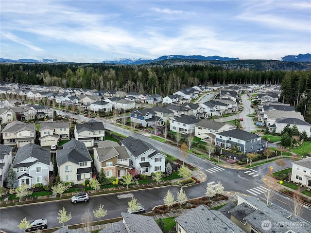 32898 Pine Ave SE, Black Diamond, WA 98010 - bird's eye view featuring a wooded view, a mountain view, and a residential view