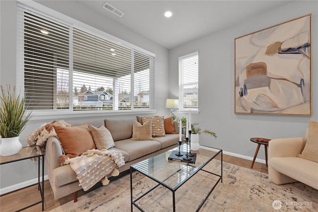 32898 Pine Ave SE, Black Diamond, WA 98010 - living room featuring recessed lighting, visible vents, baseboards, and wood finished floors
