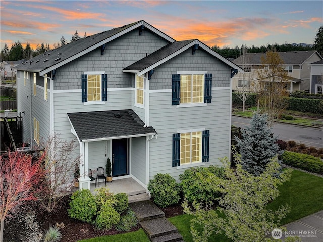 32898 Pine Ave SE, Black Diamond, WA 98010 - traditional-style home featuring roof with shingles and a porch