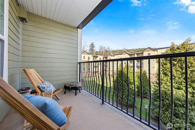 balcony featuring a residential view