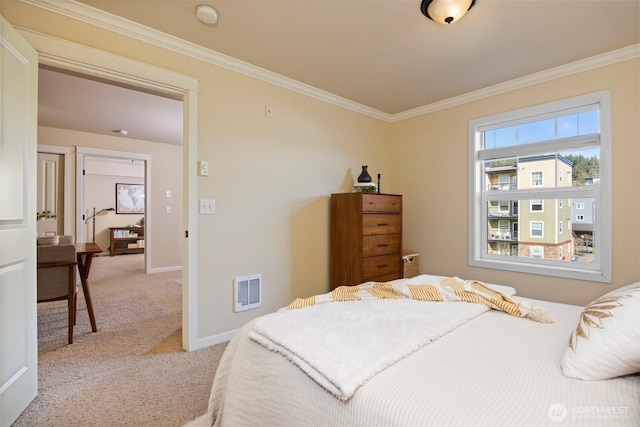 bedroom featuring crown molding, carpet, and baseboards