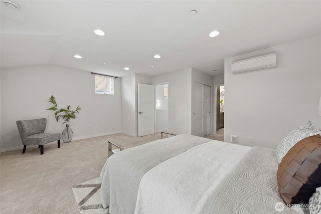 bedroom with light carpet, recessed lighting, a wall mounted AC, and baseboards