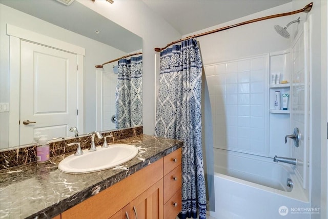 full bathroom with shower / bath combo with shower curtain and vanity