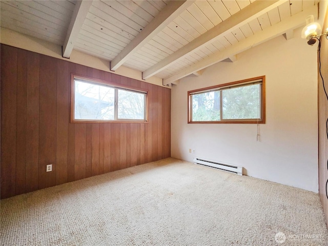 carpeted spare room featuring a baseboard heating unit, wood ceiling, wood walls, and vaulted ceiling with beams