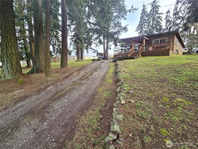 view of road featuring driveway