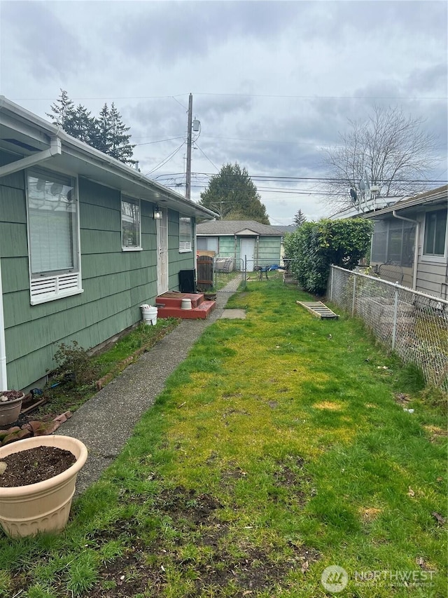 view of yard with fence