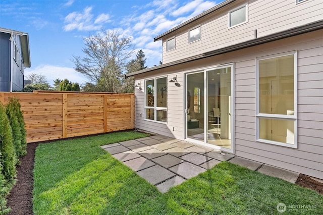 view of yard featuring a patio area and fence