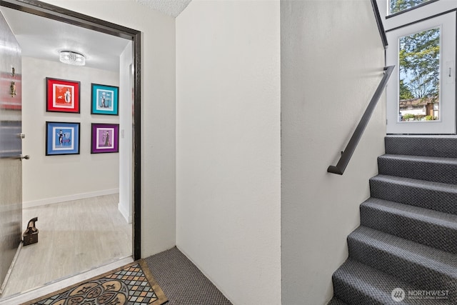 stairway with baseboards