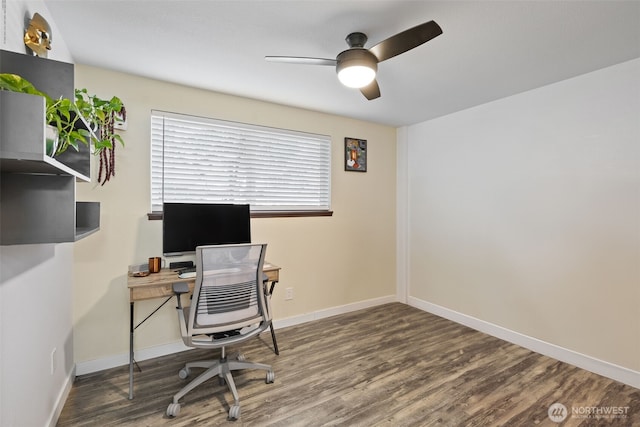 office area featuring a ceiling fan, wood finished floors, and baseboards