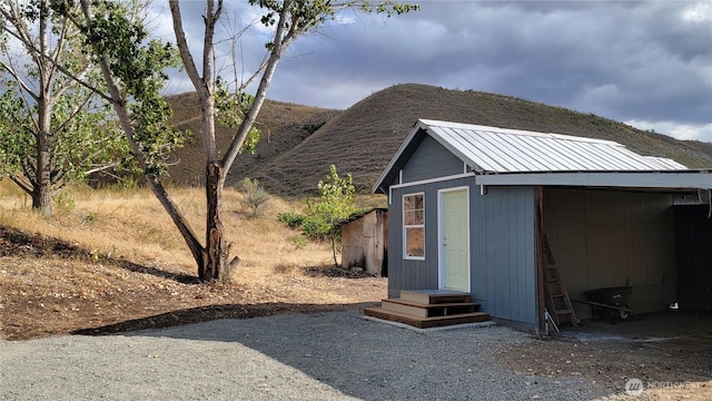 view of outbuilding featuring an outdoor structure