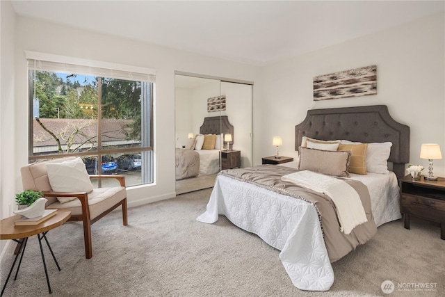 carpeted bedroom with a closet