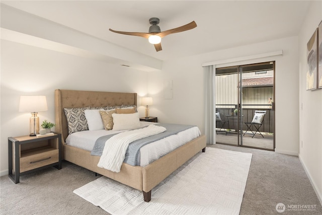 carpeted bedroom featuring access to exterior, baseboards, and ceiling fan