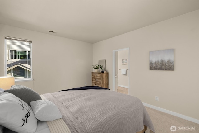 bedroom featuring visible vents, carpet, and baseboards