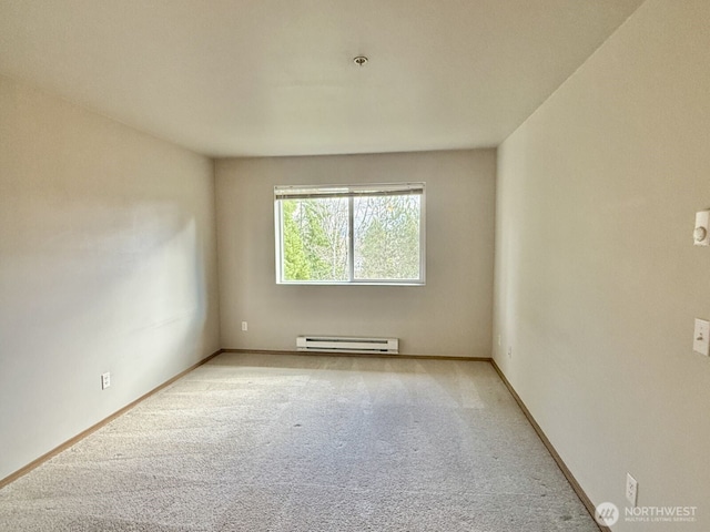 unfurnished room featuring carpet flooring, baseboards, and a baseboard radiator